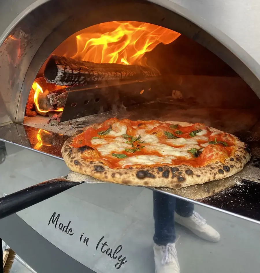 How Does a Pizza Go From Dough to Slice in Norco CA?